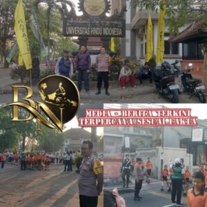 Jalan Santai Dies Natalis ke-63 UNHI, Bhabinkamtibmas Penatih Bersama Pecalang Atensi Keamanan dan Arus Lalu Lintas